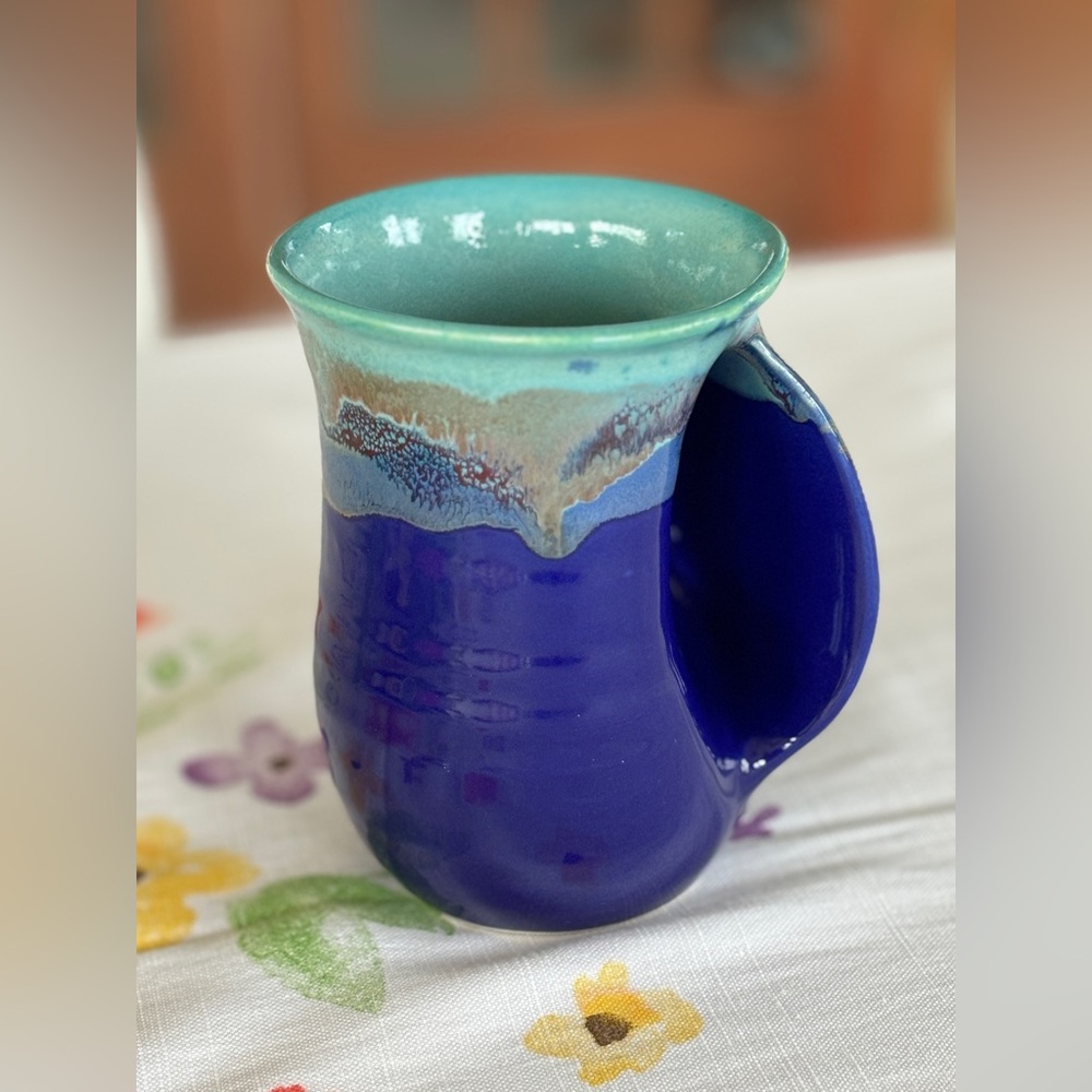 2015 Neher/Clay in Motion Handwarmer Mug in the "Mystic Water" glaze pattern.